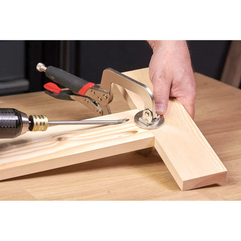 Rock Solid Pocket Hole Jig Face Clamp For Seamless Frame Joinery featuring adjustable pressure on flat wood pieces.
