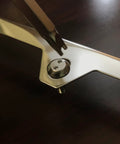Lock Down Your Rolling Rig With Stainless Steel License Plate Screws Crafted Into Rust Proof Anti Theft Bolts Mounted With Glossy Chrome Caps For A Snug Fit And Zero Hassle Install close-up of chrome bolt and screw being fitted.