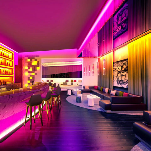 Stylish lounge illuminated with Two Rolls 130 Ft LED Strip Lights For Bedroom Color Changing Lights With Music Sync App Control And Remote