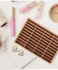 Slick Multi Grid Jewelry Tray Wooden Desktop Organizer Phone Stand For Rings Earrings And Bracelets Elegant Catch All Station on table with accessories.
