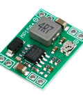 Close-up of Six Pack MP1584EN Buck Converter Module Kit for DIY Electronics showing detailed components and green circuit board.