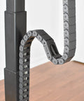 Flexible Under Desk Cable Raceway for Sit Stand Desks, Sleek S Shaped Channel, black, showing smooth bend radius and movement.