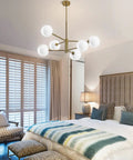 Globe Chandelier 6 Lights Dope Modern Gold Finish With Glass Globe Shades Sputnik Style Mid Century Pendant Lighting in bedroom