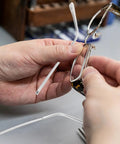 Hands installing Metal Eyeglass Arms Replacement Pair For Eyewear And Sunglasses With Slip Design For Quick Repairs And Extra Comfort