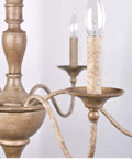 Close-up of Montreal 29 Inch Six Light French Country Chandelier with smoked birch finish showing candle-like bulb holder.