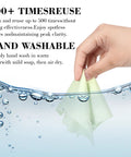Amazon INFICRIME microfiber glasses cloth, light green, front view being wrung out in water