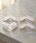 4 Pack Soft PVC Table Corner Protectors With Adhesive Edge Guards for Cupboards on a stone surface