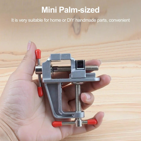 Built Tough Mini Table Vise Crafted From Premium Aluminum Alloy Featuring Wide Flat Jaws For A Killer Hold in a palm-sized size.