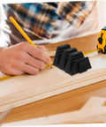 Person measuring wood next to 12 Piece Modular Wrench Rack Organizer Tray For Wrenches Space Saving Plastic Garage Organizer For Tool Storage Durable