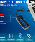 Universal USB charger next to laptop for Beast 400 Lumen Underwater Dive Light For Scuba Diving And Snorkeling IPX8 Waterproof.