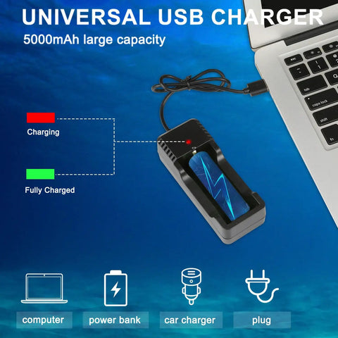 Universal USB charger next to laptop for Beast 400 Lumen Underwater Dive Light For Scuba Diving And Snorkeling IPX8 Waterproof.