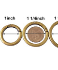 4 Pack Round Carabiner Key Rings With Spring Snap Clips And Flat O Rings In Brushed Brass Finish, shown in various sizes.