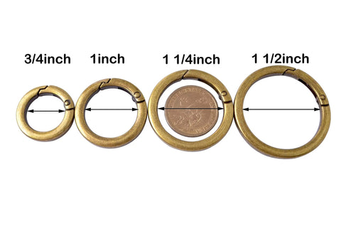 4 Pack Round Carabiner Key Rings With Spring Snap Clips And Flat O Rings In Brushed Brass Finish, shown in various sizes.