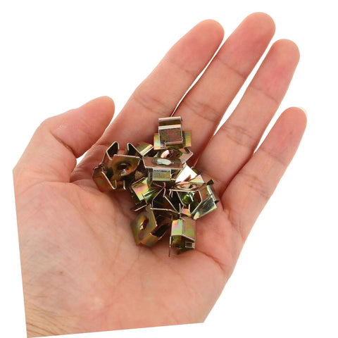 50Pcs Gold Iron Captive Nut U-Clip Fasteners for Car Bumper Grill and License Plate Mounting in a hand, showing steel clips.