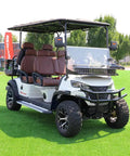 Six Seater Electric Golf Cart With 60V 105Ah Battery And Advanced Suspension Front And Rear Storage Super Fast Charging Smooth Handling Built Tough For Parks Hotels And Resort Shuttles Ready To Roll Out parked on grass with spacious seating.