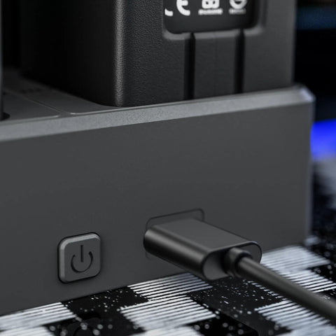 Close-up of power button and port on 3 In 1 Drone Battery Charger Hub For Phantom 4 Series With LED Display, Charges Three Batteries In A Row.