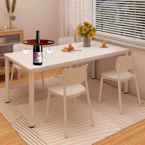 Dining table setup with Two Pack Classic Wine Caddy Router Templates One Quarter Inch Thick Acrylic Carving Jigs displayed holding wine bottle and glasses.