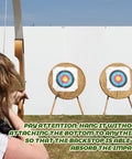 Archer aiming at two targets with 5x5 Ft Archery Backstop Netting Arrow Catcher for Bow Training in outdoor setting