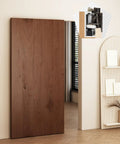 Hidden Barn Door Hardware Kit With Soft Close Mechanism And Concealed Track Setup For Closets shown with sleek wooden door.