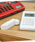 Chest Freezer Door Hinge Assembly Heavy Duty Spring Replacement For Energy Saving And Enhanced Seal With Low Temperature Reliability And Universal Compatibility For Freezers And Refrigerators next to electronic devices on a table.