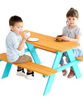 Two children sitting at a Wooden Outdoor Kids Picnic Table And Bench Set In Brown And Aqua, enjoying snacks.