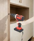Using Top Tier 12V Cordless Drill Driver Set With Fast Lane Battery Charger on a cabinet for easy assembly.
