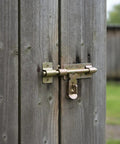 Heavy Duty Galvanized Steel Slide Bolt Gate Latch For Outdoor Garden Fences Barn Doors And Shed Entrances mounted on wooden fence