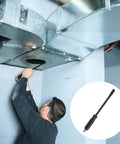 Person using 12 Inch Duct Slitter Hand Sheet Slicer for cutting metal pipes in ductwork, showing beveled notch tip and durable metal build