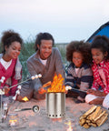 Family enjoying Pellet Tabletop Fire Pit 7 Inch Mini Outdoor Fire Pit with roasting sticks and firewood on beach