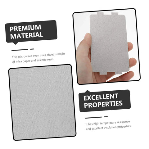 Hand holding one of the Twenty Pack Microwave Mica Plate Sheets Easy DIY Repair Heat Resistant Insulation For Ovens