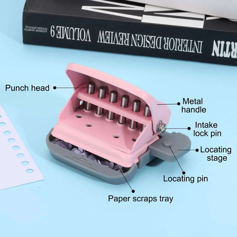 Six Hole Paper Punch One Quarter Inch Metal Hole Puncher for office and home, pink, showcases metal handle and locating pin.