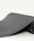 Air Step Anti Fatigue Vinyl Floor Mat 2x3 Black for all day comfort, rolled side view, three eighths inch vinyl foam core