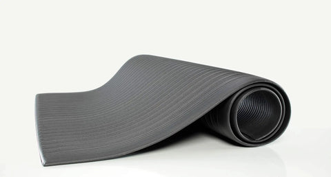 Air Step Anti Fatigue Vinyl Floor Mat 2x3 Black for all day comfort, rolled side view, three eighths inch vinyl foam core