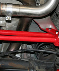 Panhard Bar Relocation Kit For 1982 2002 Camaro And Firebird Black Finish Street Ready Bolt On Upgrade Replaces Upper Support And Relocates Lower Bar To Make Room For Up To 3 Inch True Dual Exhaust Over Passenger Side Axle installed under Camaro rear axle with red bracket