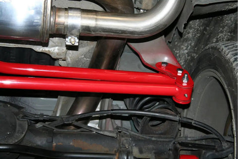 Panhard Bar Relocation Kit For 1982 2002 Camaro And Firebird Black Finish Street Ready Bolt On Upgrade Replaces Upper Support And Relocates Lower Bar To Make Room For Up To 3 Inch True Dual Exhaust Over Passenger Side Axle installed under Camaro rear axle with red bracket
