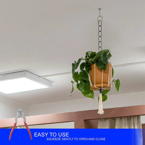 7 Inch Spring Loaded Fixture Chain Pliers With Red Vinyl Grip And Silver Finish shown near ceiling light and hanging plant.