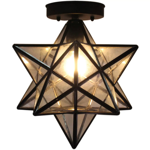 Moravian Star Tiffany Style Clear Glass Ceiling Light With Matte Black Base 12 Inch Shade glowing from below