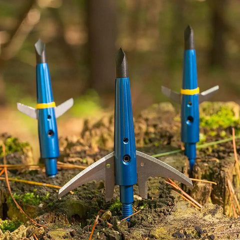 Levi Morgan Series 2-Blade Mechanical Broadheads 100 Grain Expandable with 2.0 Inch Cut, 4 Pack in Blue on forest stump