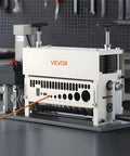 Electric Wire Stripper Workhorse with 11 feed channels, automatic and manual modes, visible on a workshop table; 370W motor, Emergency Stop