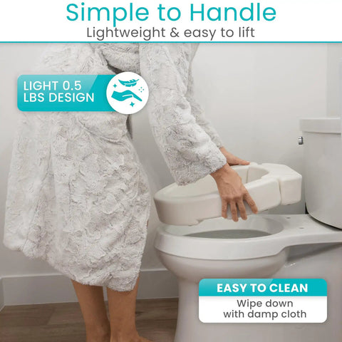 Person placing Raised Toilet Seat Riser 3.5 Inch Height for Standard Round Toilets, easy to handle and clean.