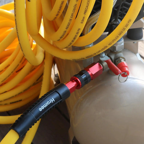 Universal Air Coupler And Plug Kit With Quarter Inch Threads And 36 Aluminum Fittings For Air Compressors connected to hose