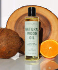 Natural Wood Conditioning Oil With Coconut Oil For Natural Furniture Care Orange Scent 8 Oz 100 Percent Plant Based Petrochemical Free Safe On Raw Waxed Or Oiled Wood Finishes bottle with coconut and orange