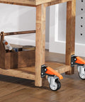 Heavy Duty Workbench Caster Kit With 880 Lbs Capacity, 3 Inch Retractable Casters, side view mounted on wooden table
