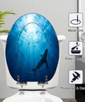 Elongated Silhouettes sharks underwater ocean against bright Toilet Seat on a white toilet, featuring a metal link design.