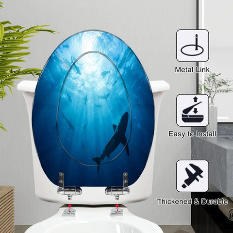 Elongated Silhouettes sharks underwater ocean against bright Toilet Seat on a white toilet, featuring a metal link design.