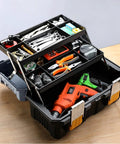 Heavy Duty Three Tier Folding Toolbox With Secure Steel Latch And Slick Compartments For Hammers Pliers Screwdrivers Wrenches Smooth Workshop Organization For Home Trucks Or Mechanic Gear No Sweat Storage filled with tools like wrenches and drills.