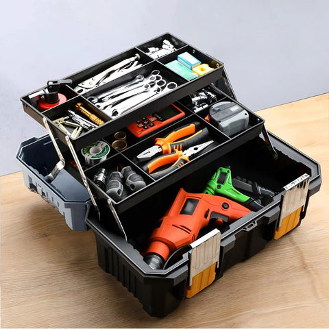 Heavy Duty Three Tier Folding Toolbox With Secure Steel Latch And Slick Compartments For Hammers Pliers Screwdrivers Wrenches Smooth Workshop Organization For Home Trucks Or Mechanic Gear No Sweat Storage filled with tools like wrenches and drills.