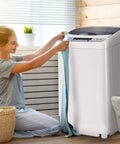 Woman using Straight Up Reliable Portable Full Automatic Washing Machine With Built In Drain Pump And Smart Digital Controls 12 Pound Capacity.