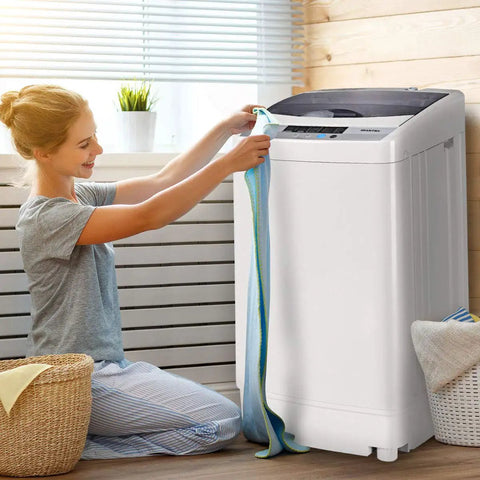 Woman using Straight Up Reliable Portable Full Automatic Washing Machine With Built In Drain Pump And Smart Digital Controls 12 Pound Capacity.