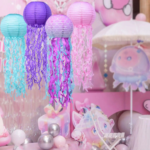 Jellyfish Paper Lanterns 6 Pack Hanging Lit Colorful Lanterns For Mermaid Unicorn Theme Classroom Decor Under The Sea Ocean Birthday Party Decorations For Undersea Parties Classroom Decor And Birthday Celebrations, featuring pink, purple, and teal jellyfish lanterns.